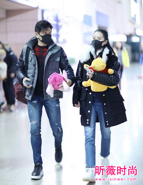华语明星时尚机场街拍 杨幂冷得要命也要穿时髦