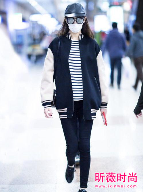 唐嫣机场街拍越穿越美 甜美帅气造型轻松驾驭
