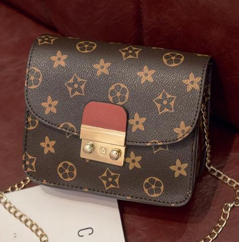 堪比大牌的几款迷你链条单肩包:时尚又潮流(图) 堪比大牌的几款迷你链条单肩包:时尚又潮流(图)