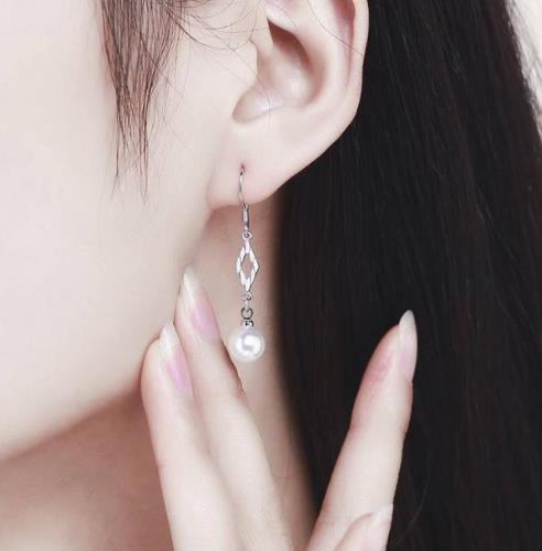 流苏耳环帮你打造精致小脸庞：让你更美一点（图）