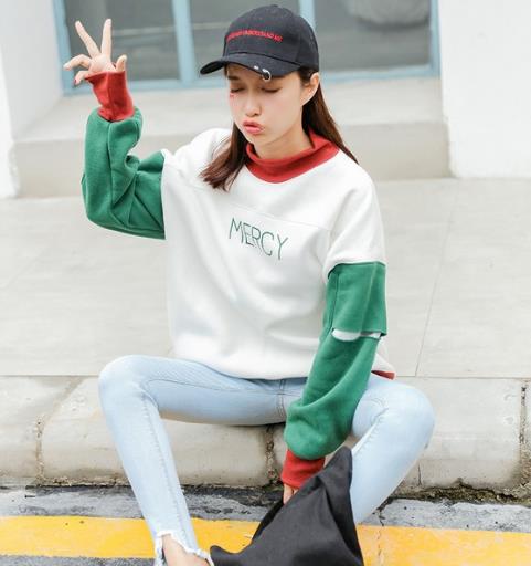 刺绣宽松套头卫衣怎么搭配裤装：甜美文艺范儿（图）