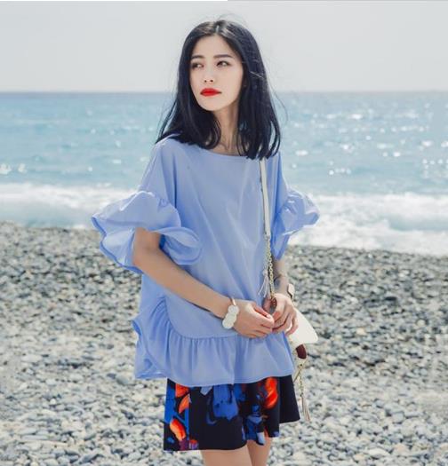 今年很流行的宽松荷叶边衬衫：优雅时尚衬衫分享（图）