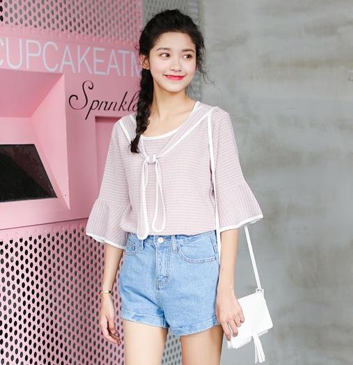 新款糖果色镂空T恤的多种搭配：少女感十足（图）