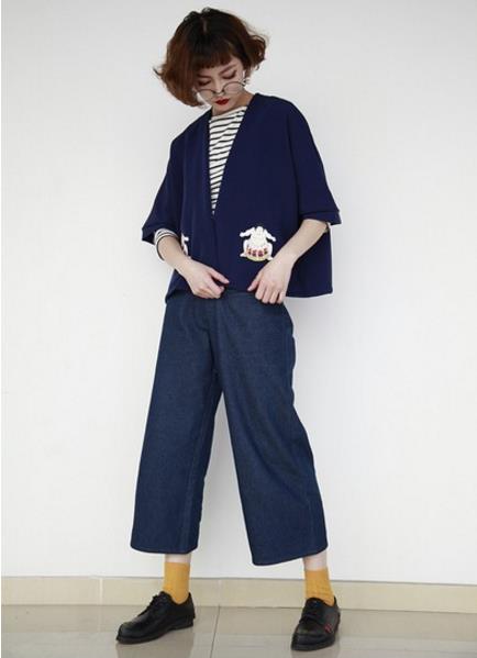 今年巨流行裙式风衣怎么搭配：经典英伦风衣分享（图）