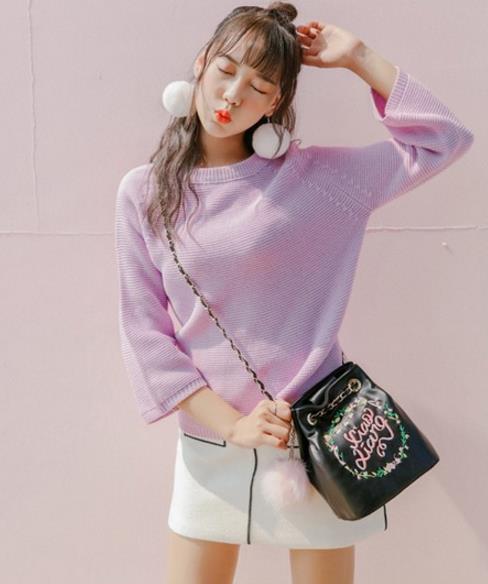 5款回形针搭扣小方包搭配：简洁知性小方包推荐（图）