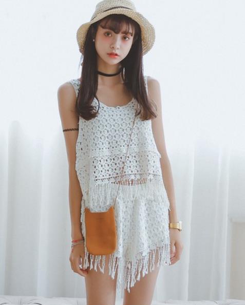 韩版女装白色刺绣上衣：清纯的诱惑(图)