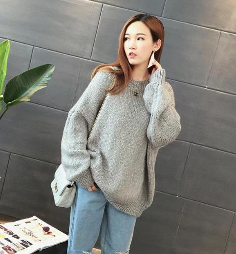 灯笼袖粗毛线高领毛衣搭配针织裙：时尚舒适（图）