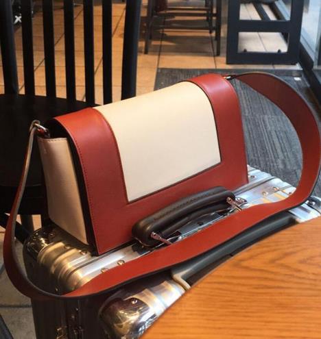 简约牛皮复古手提包：6款手提包增添时尚韵味（图）