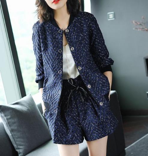 新款长袖风衣适合轻熟职业女性：修身显瘦（图）