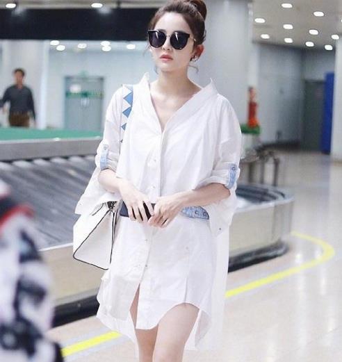 娜扎机场秀一不留神就火了“衬衫裙”：女神范十足