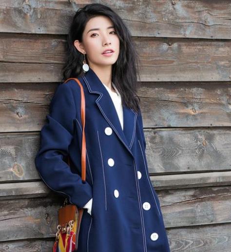 秋季多备中长款风衣：遮肚显瘦彰显英伦风情（图）