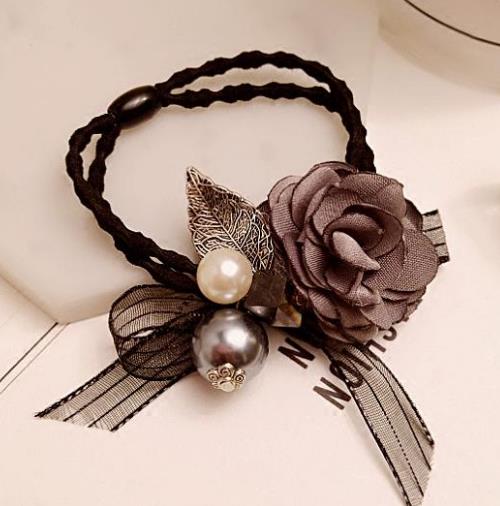 韩国蝴蝶结发绳头饰搭配：优雅女人味头饰推荐（图）