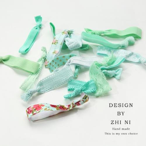 韩国蝴蝶结发绳头饰搭配：优雅女人味头饰推荐（图）