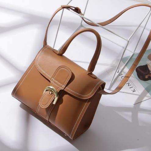 明星同款圆环手提斜挎包：简约时尚斜挎包推荐（图）