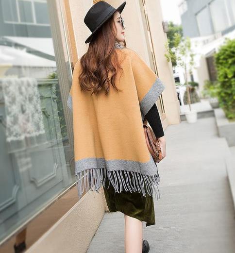 针织披肩让你引领早秋时尚：优雅百搭披肩搭配（图）