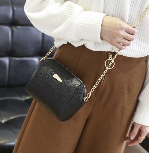 都市丽人的偏爱款蛇纹小方包：尽显性感魅力（图）