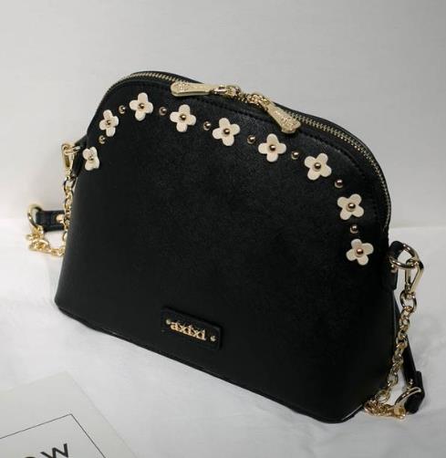 精美时尚韩版花朵链条包：轻松绽放无限魅力（图）