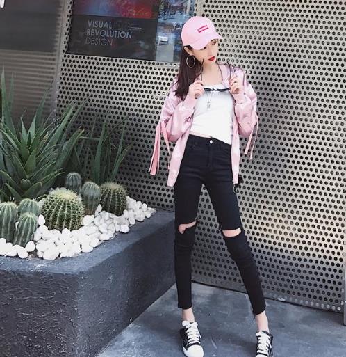 潮范个性破洞牛仔裤：显瘦牛仔裤演绎主流时尚（图）