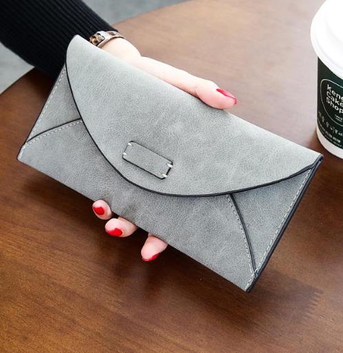 6个造型别致的心形吊牌流苏挂件钱包搭配推荐（图）