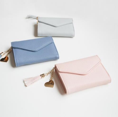 6个造型别致的心形吊牌流苏挂件钱包搭配推荐（图）