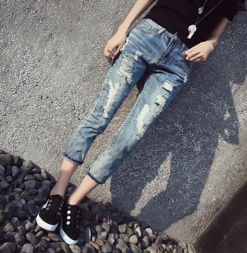 胖美眉专属牛仔裤：显高显瘦黑色破洞小脚裤（图）