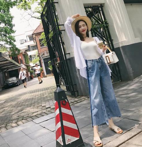 显高显瘦的高腰破洞牛仔裤：带你玩转时尚个性（图）