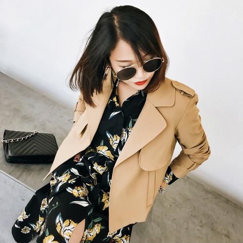 拉链翻领夹克外套搭配网纱裙：帅气又甜美（图）