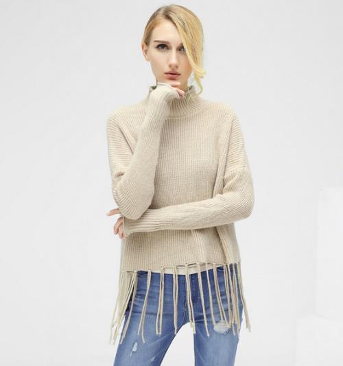 短裙搭配流苏喇叭袖针织衫：时尚减龄甜美范（图）