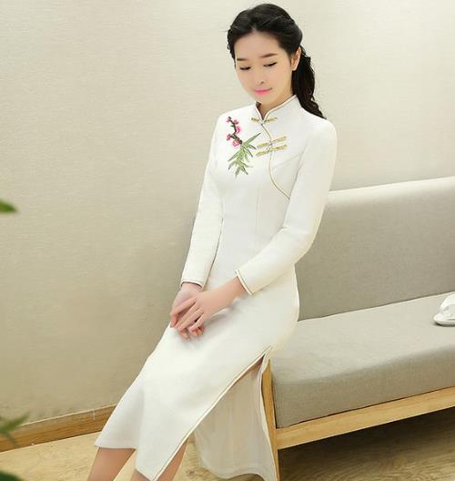 翻领高腰毛呢外套搭配网纱连衣裙:时尚显瘦(图) 翻领高腰毛呢外套搭配网纱连衣裙:时尚显瘦(图)