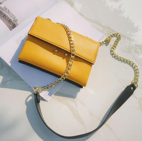 时髦有型的简约撞色单肩包搭配：潮流复古风（图）