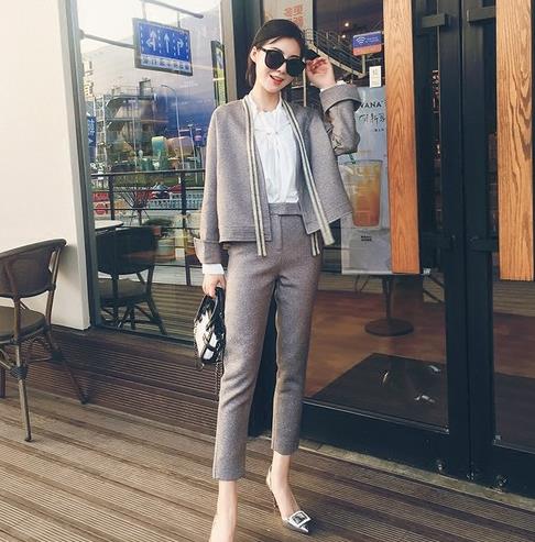 格纹西装中裙两件套多种搭配：知性不失个性（图）