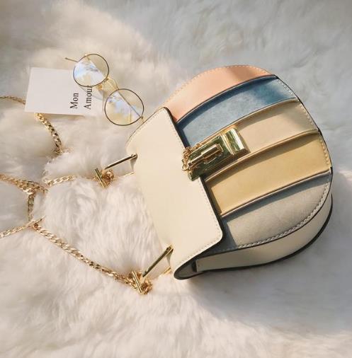 亮片锁扣链条包搭配:洋气链条包打造百变风格(图) 亮片锁扣链条包搭配:洋气链条包打造百变风格(图)