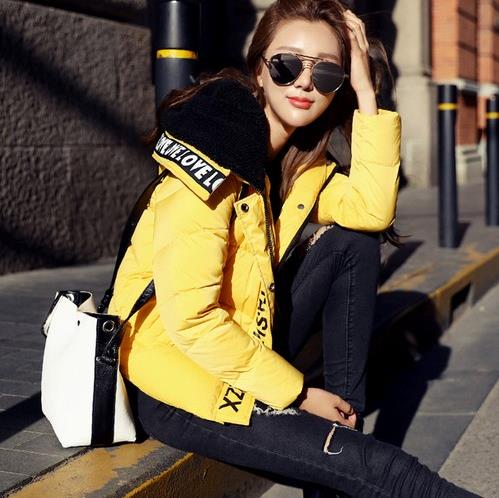 连帽加厚修身羽绒服搭配：彰显女性知性优雅（图）