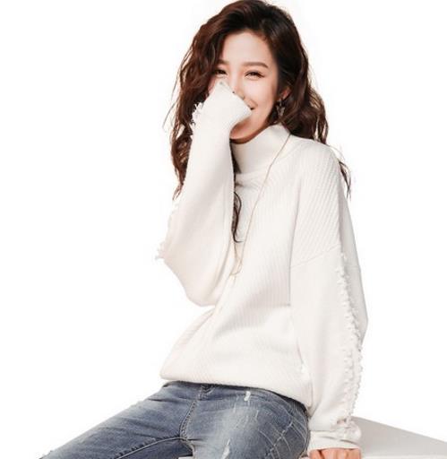 单穿打底都好看的最新款麻花针织宽松高领毛衣（图）