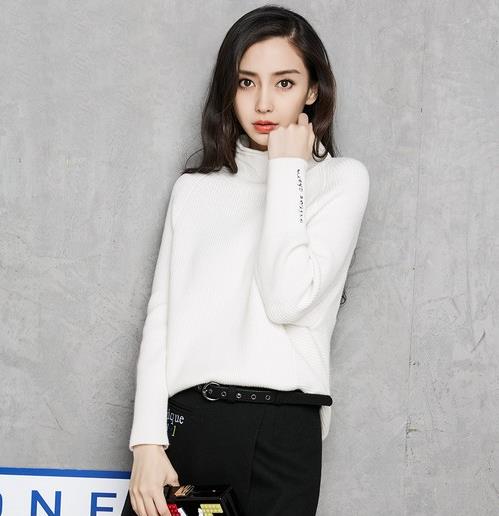 单穿打底都好看的最新款麻花针织宽松高领毛衣（图）