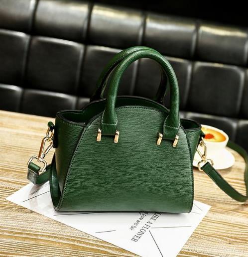 新款真皮迷你手提单肩包：简约洋气单肩包推荐（图）