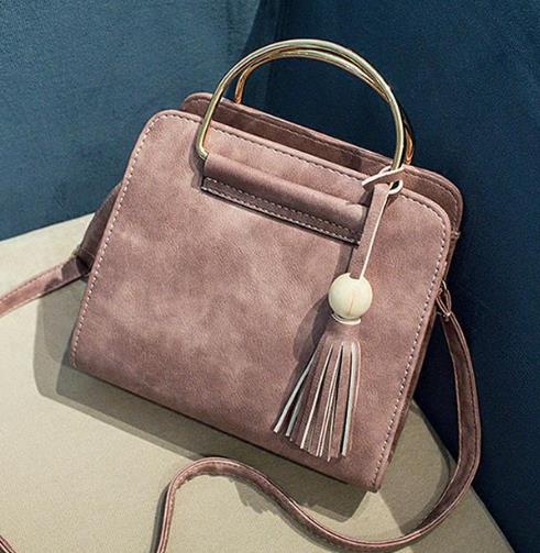 高颜值欧美流苏杀手包搭配：个性时尚杀手包分享