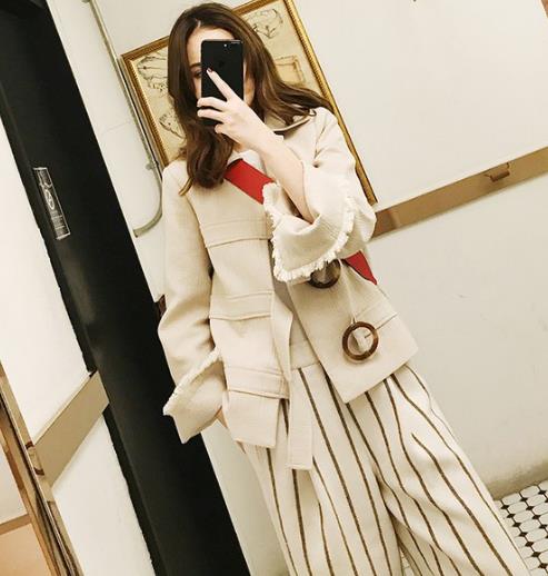 小个子穿这几款流苏毛边毛呢短外套显高又时尚（图）