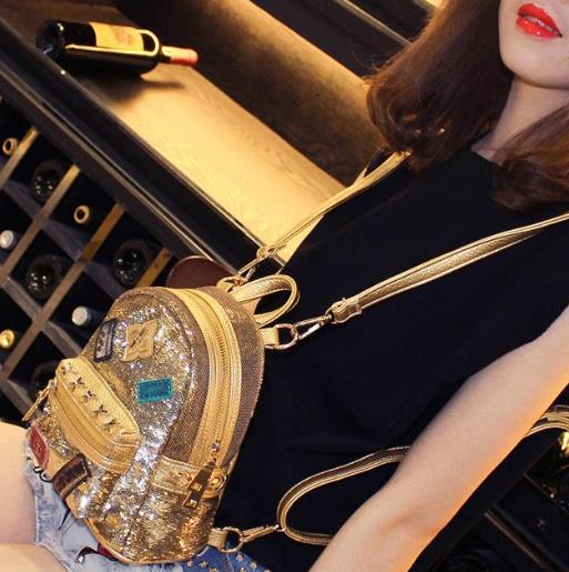 韩版牛皮撞色迷你双肩包：简约又不失时尚（图）