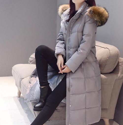 加厚长款羽绒服搭配牛仔裤彰显时尚潮流范儿（图）