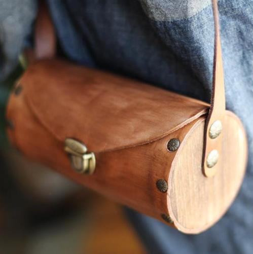 真皮复古手拎包斜跨包的多种搭配:时尚百搭(图) 真皮复古手拎包斜跨包的多种搭配:时尚百搭(图)