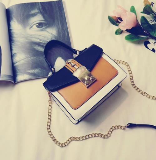 新款真皮流苏单肩铆钉链条包搭配:十足女人味(图) 新款真皮流苏单肩铆钉链条包搭配:十足女人味(图)