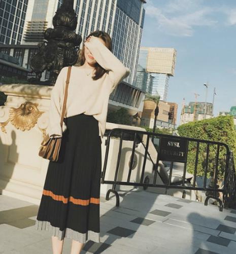 时尚优雅半身裙的多种穿搭：冬日浪漫女人味（图）