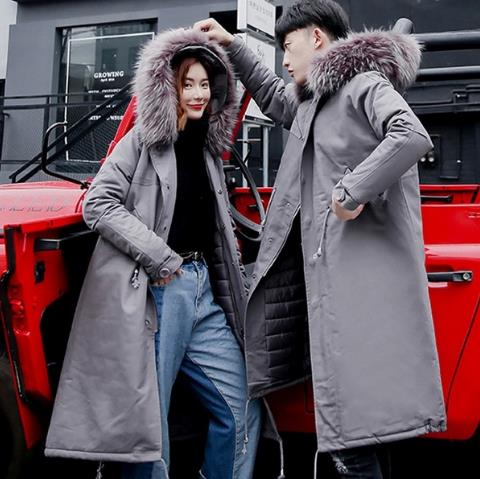 大毛领加厚羽绒服的搭配足够暖化了冬日寒风（图）
