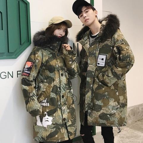 大毛领加厚羽绒服的搭配足够暖化了冬日寒风（图）