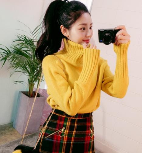 高领针织衫保暖显气质：秀出你的美脖颈（图）