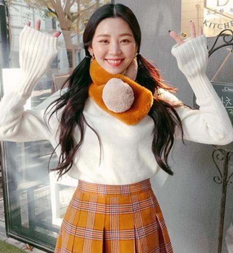 高领针织衫保暖显气质：秀出你的美脖颈（图）