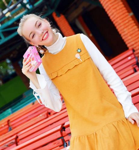 冬季日常时尚穿搭：荷叶边毛衣保暖又时髦（图）