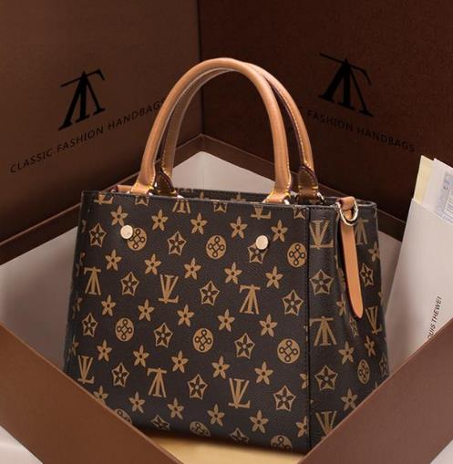 怎么背都很美的单肩斜跨牛皮复古手提包（图）