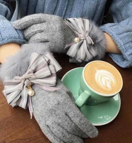 手套也花样百出:保暖减龄样样行(图) 手套也花样百出:保暖减龄样样行(图)